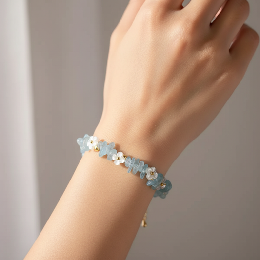 Aquamarine bracelet worn on wrist in natural window light
