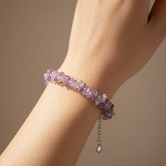 Amethyst bracelet worn on wrist in natural window light