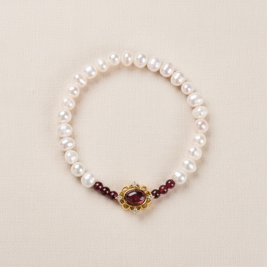 Freshwater Pearl & Garnet Lotus Bracelet — flat lay main image