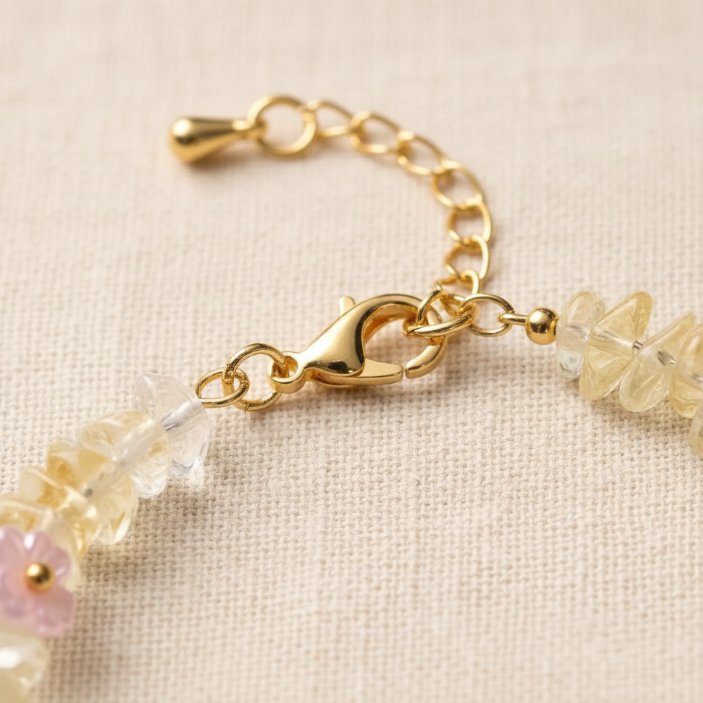 Gold lobster clasp and extension chain close-up