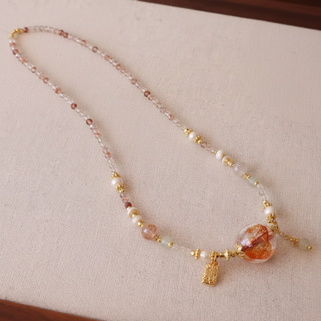 Crystal Pearl & Lampwork Flower Necklace — main product image on cream linen