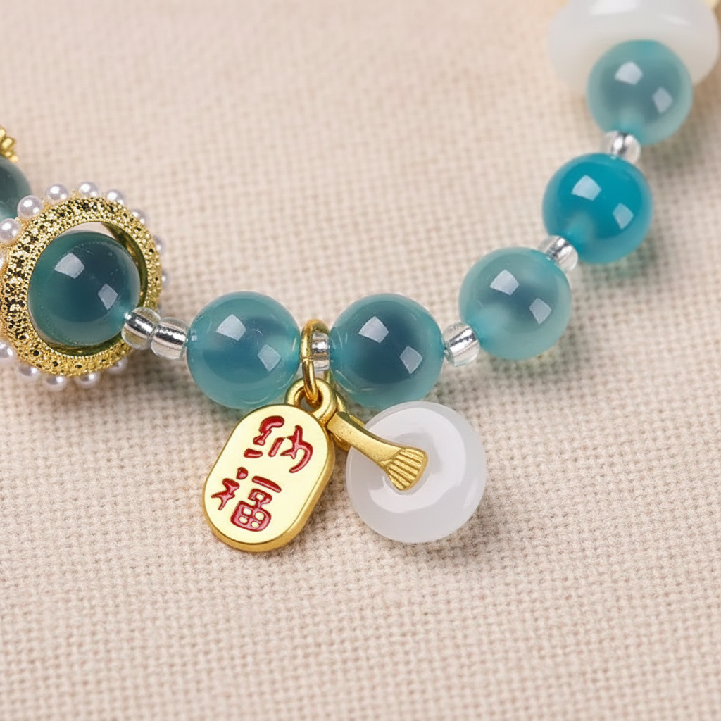 Carved lotus and fortune tag pendant detail